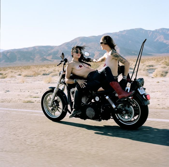 Girls on a motorcycle in South Tarawa