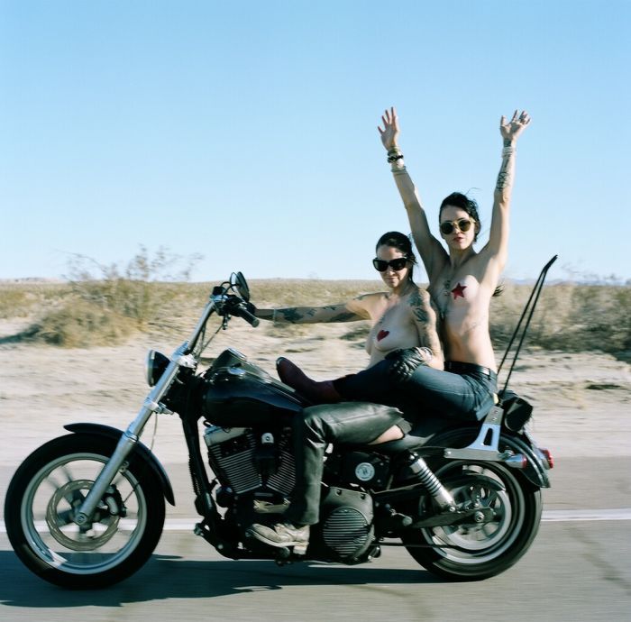Girls on a motorcycle in South Tarawa