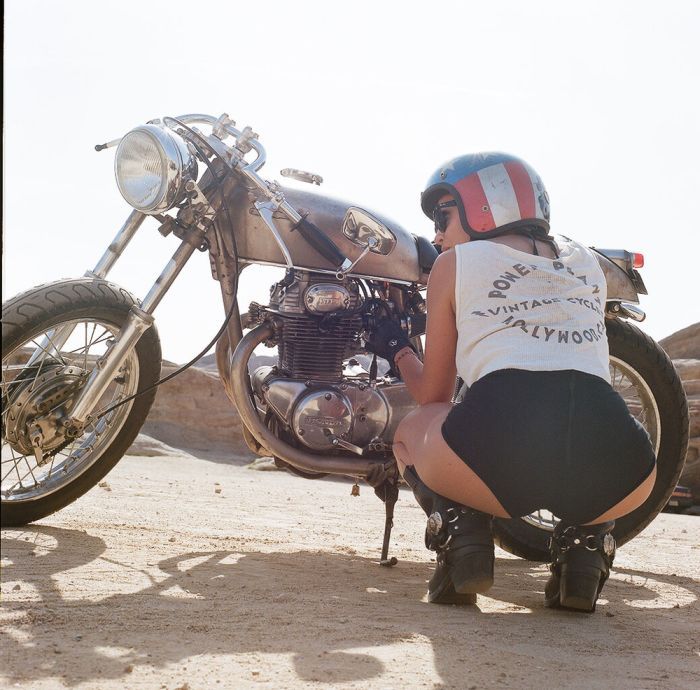 Girls on a motorcycle in South Tarawa